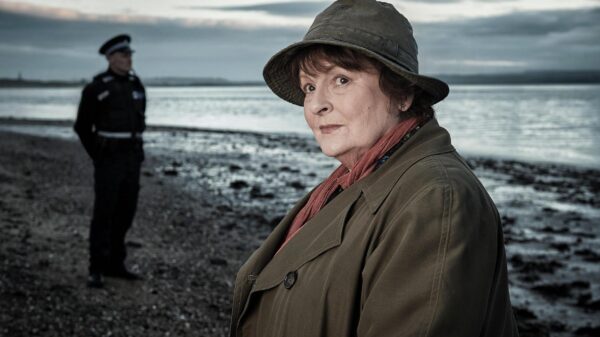 Brenda Blethyn as Vera, in trademark hat and trenchcoat