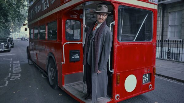 Bookish - Mark Gatiss as Gabriel Book, on the back of a London routemaster bus